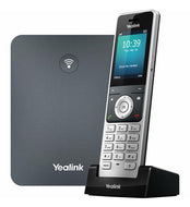 Yealink W76P DECT IP phone system featuring W56H wireless handset on charging cradle alongside compact W70B base station